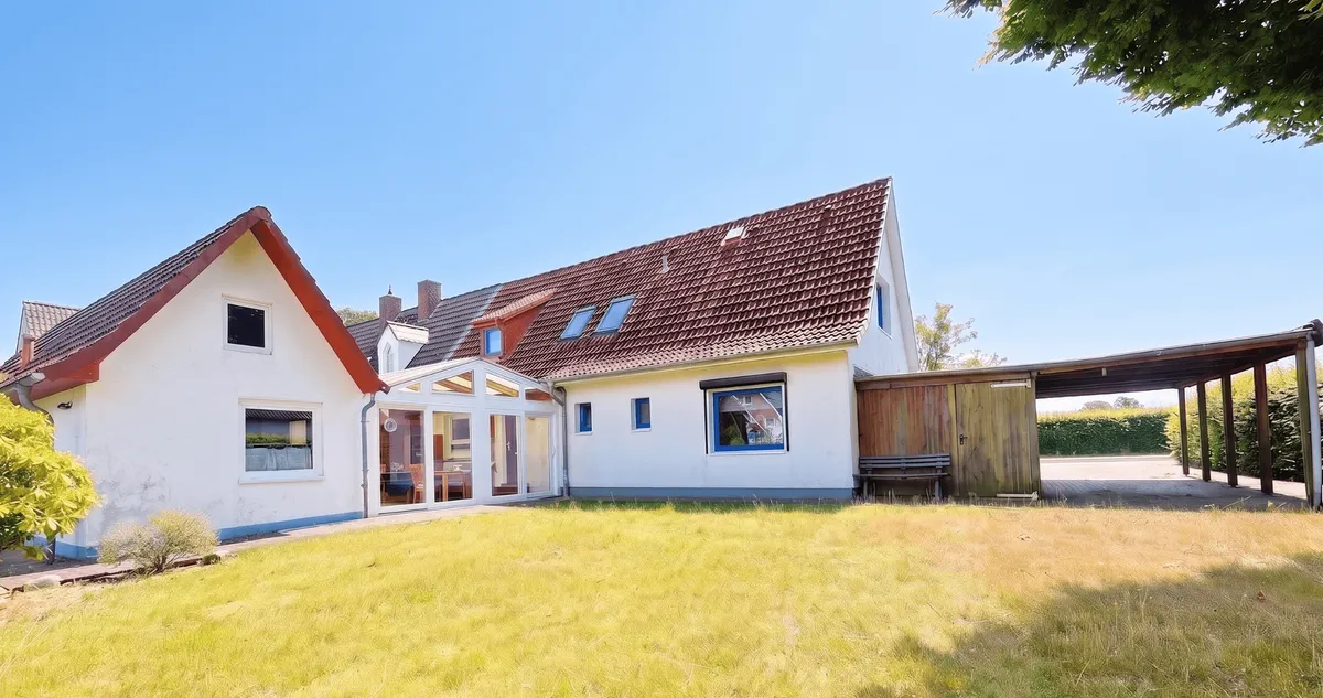 Verkauftes Zweifamilienhaus mit Wintergarten in Hasloh